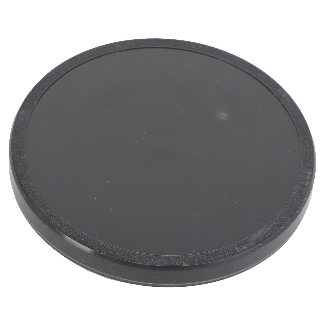 A black circular coaster or lid with a smooth surface, identified as the AGCO | Seal Cap - Acp0287200 by the brand AGCO, is shown against a plain white background. No current product description available for this item.