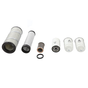 A variety of cylindrical filters and parts, including gaskets and seals, from the AGCO Field Service Kit (Acp0210090), are arranged in a row on a white background, featuring mesh, paper, and metal components of different sizes and shapes.