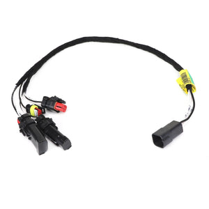 A black electrical wiring harness, AGCO | Harness - Acw7469240 by AGCO, featuring multiple connectors, including a red-capped plug and a yellow label, is pictured against a white background. Please note that no current product description information is available for this item.