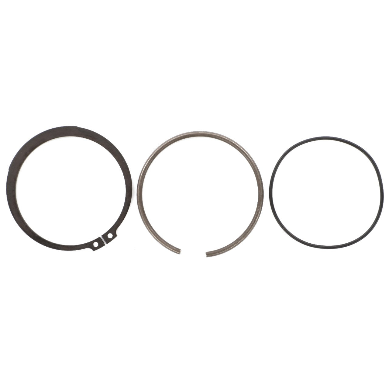 The AGCO | PARTS KIT - F931860030140, featuring three different types of circular retaining rings, is arranged in a row against a plain white background, with no current information available on their specifications.