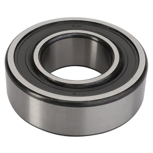 The AGCO Ball Bearing - Acp0281060 is a durable metal cylindrical bearing featuring an inner and outer ring. It also includes a black rubber seal securely fitted around the inner ring.