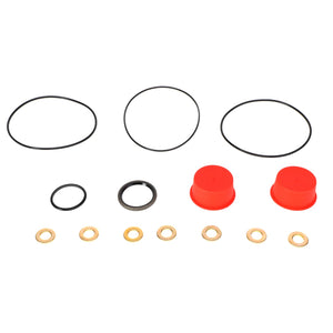 An assortment of small components from the AGCO | SEALS KIT - 0.003.5059.3, including black O-rings, red cap-like pieces, brass washers, and a black gasket, arranged in rows on a plain background. For any product questions or ordering inquiries, feel free to contact support.