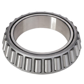 A cylindrical roller bearing, known as the AGCO | BEARING CONE - AG520699 from the AGCO brand, features a metal outer ring and evenly spaced rollers inside, designed to handle both radial loads and some thrust loads.