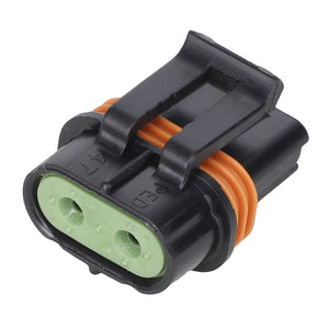 No current product description information is available for this close-up of the AGCO CONNECTOR - AG517662, a black and green two-pin electrical connector with an orange rubber seal.