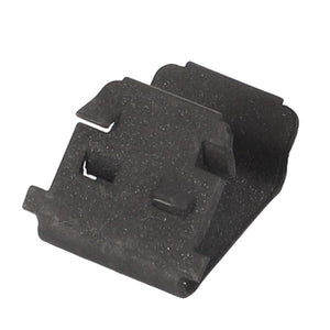 The AGCO | Fastener - 3909727M1 is a small, black, rectangular clip made of rough-textured material with cut-out sections and slightly raised edges, perfect for securely holding parts in Fendt Models or Massey Ferguson Models.