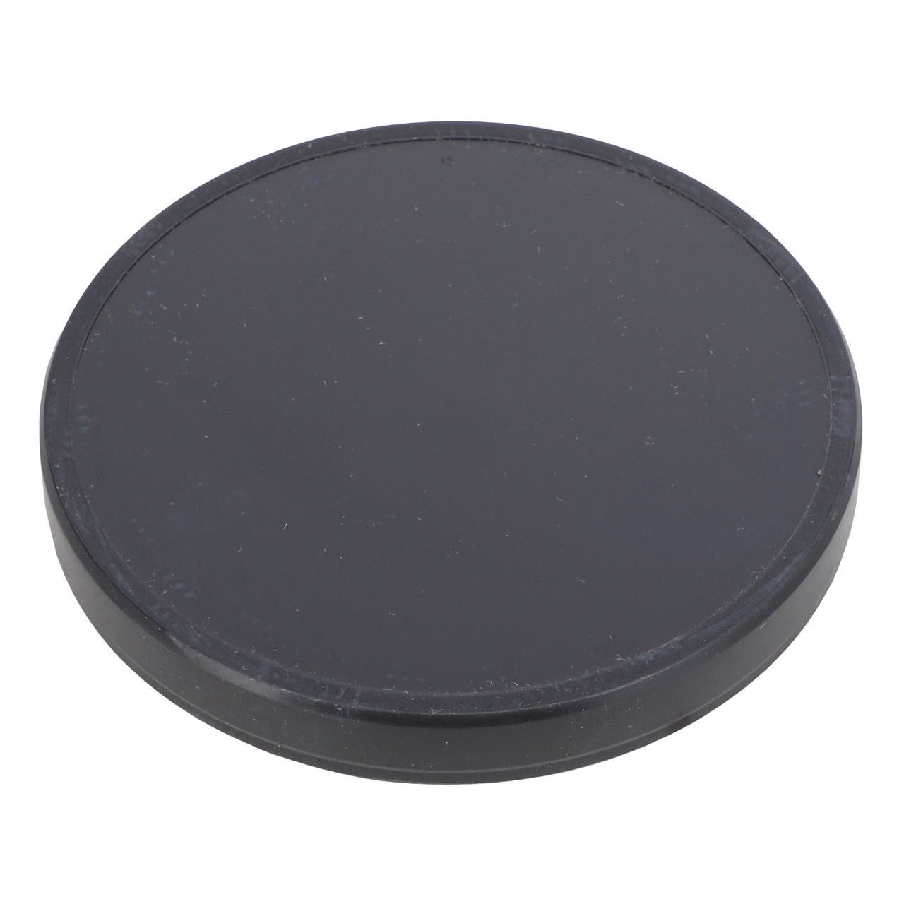 A round, flat, black object with a smooth surface—product name: AGCO | Seal Cap - Acp0287790 by AGCO.