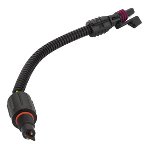 The AGCO Kit, Repair - Acp0366680 currently has no available description: it is a coiled cable with connectors on both ends, featuring a cylindrical plug on one end and a clip-style connector on the other.