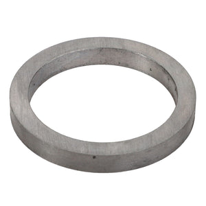 Viewed from an angle, the AGCO | INTERMEDIATE RING - V30386300 is a metallic washer ring with a circular shape and a central hole.