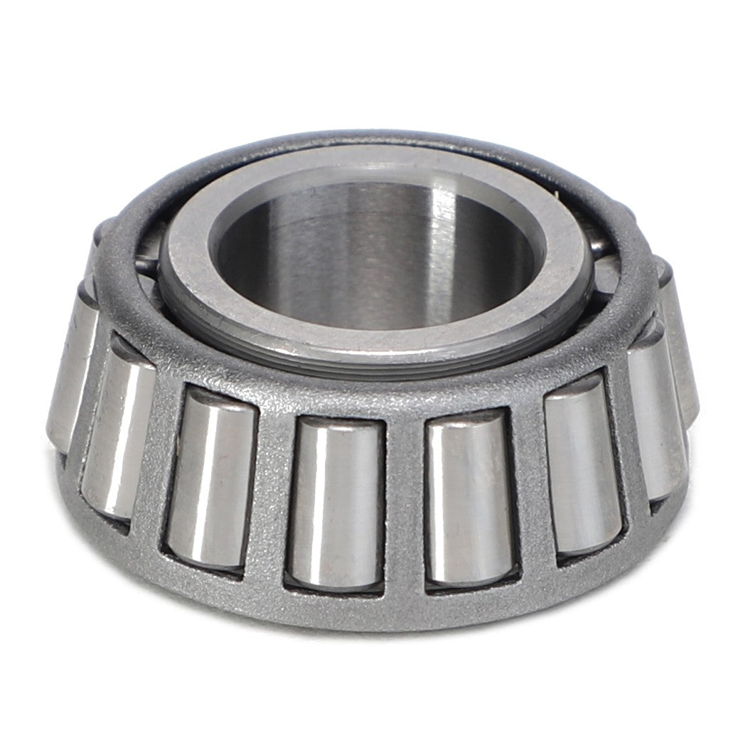 A close-up view of the AGCO Tapered Roller Bearing Cone - 831055M1, showcasing its cylindrical shape with inner and outer metal rings and tapered roller elements, commonly used in MF models.