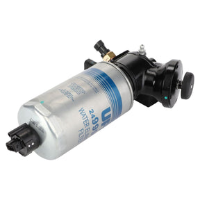 The AGCO Fuel Filter - LA323271500 is a cylindrical silver water eliminator filter with a black mounting bracket and connectors. It features a blue stripe and the text "24909" on the body, and is compatible with various Massey Ferguson tractors.