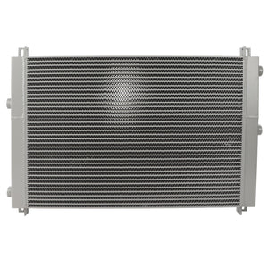 Image of the AGCO OIL COOLER - D28785651, an industrial heat exchanger with metal fins and pipes on the sides. The internal structure is visible, showing rows of finely spaced metal fins. Product by AGCO.