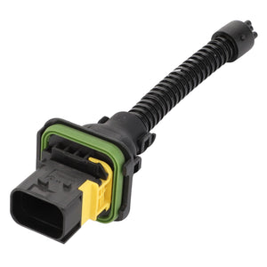 AGCO's Adapter Cable, Engine, 12 V - Acp0408450 is a black automotive electrical connector featuring a yellow and green seal connected to a coiled black wire, ensuring operating safety with the reliable performance of AGCO Parts Genuine Electrics.