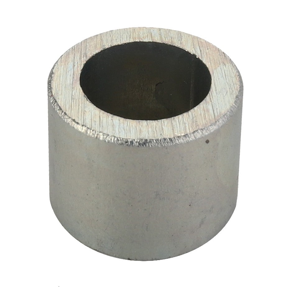 Product Description: The AGCO Bush - Acp0028270 is a small, cylindrical metal ring with a hollow center and slightly rough edges.