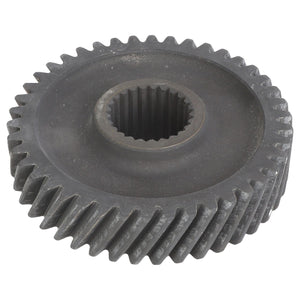 The AGCO | Drive Gear - Acw1692820 is a metal gear with helical teeth and a central hole featuring internal splines.