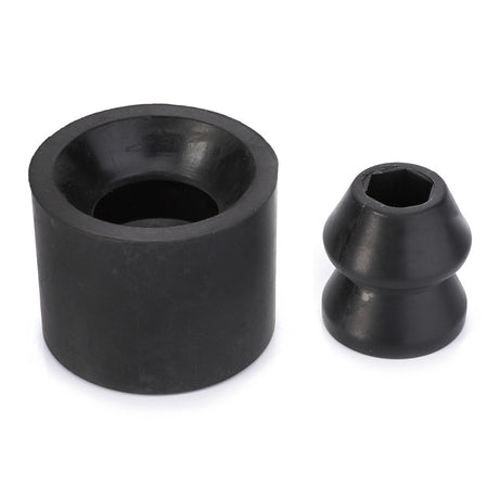 Two black rubber pieces: a cylindrical cup-shaped part on the left and a double-tapered piece with a hexagonal cavity on the right, often used in Massey Ferguson models, available as part of the AGCO | Parts Pack - 4277212M91 by AGCO.