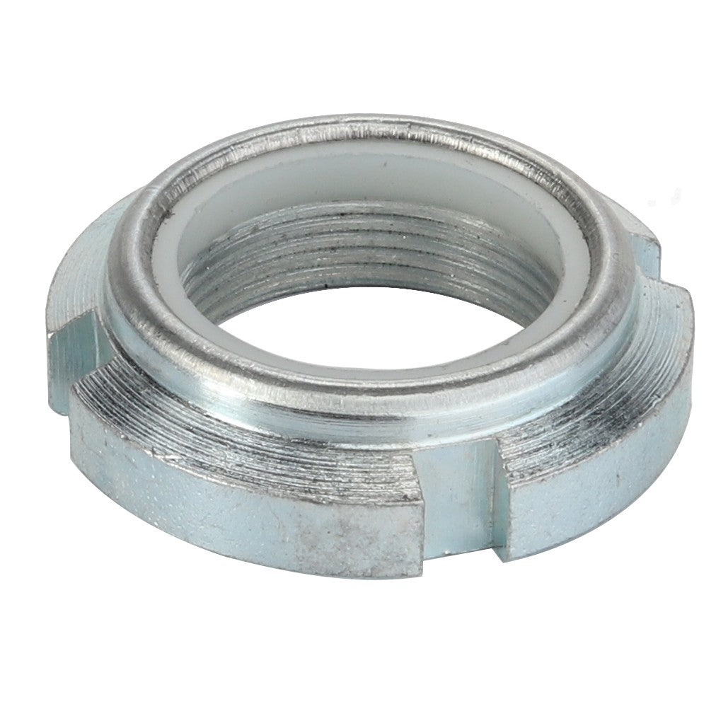 The AGCO | LOCKNUT - D46150166 is a silver metal locknut with internal threading and four outer notches, designed for secure fastening in various applications.