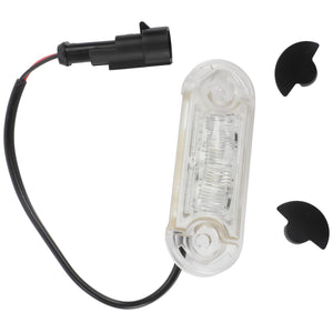 The AGCO | Lamp - Acw6837740, a clear rectangular LED light with an attached black cable and connector, is ideal for tractors like the Valtra N-series. It comes with two black plastic mounting clips for easy installation.