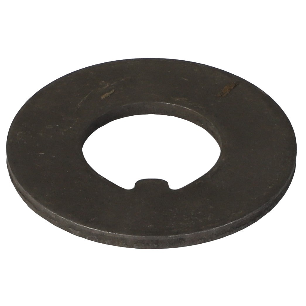 An AGCO Washer - 180010M2, flat and circular with a central hole and a notch on one side, made of metal, designed for use in Massey Ferguson equipment.