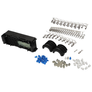 A set of electrical connectors and components arranged on a white surface includes a rectangular connector housing, various metal terminals, blue and white caps, and black plastic parts from the AGCO Disconnection Point Kit - F339900950020.