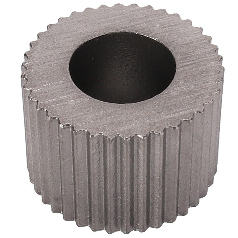 The AGCO | Transport Roller - 0362-21-00-00, a metal gear-like cylindrical object with ridged sides and a central hole, fits Valtra models.