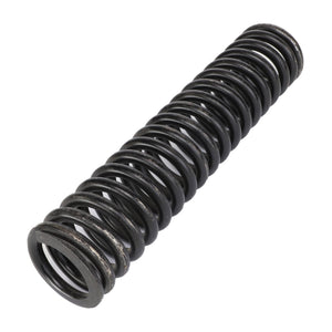 The AGCO SPRING - AG426899, a black-finished coiled metal compression spring with closely wound coils, is displayed lying horizontally against a stark white background.