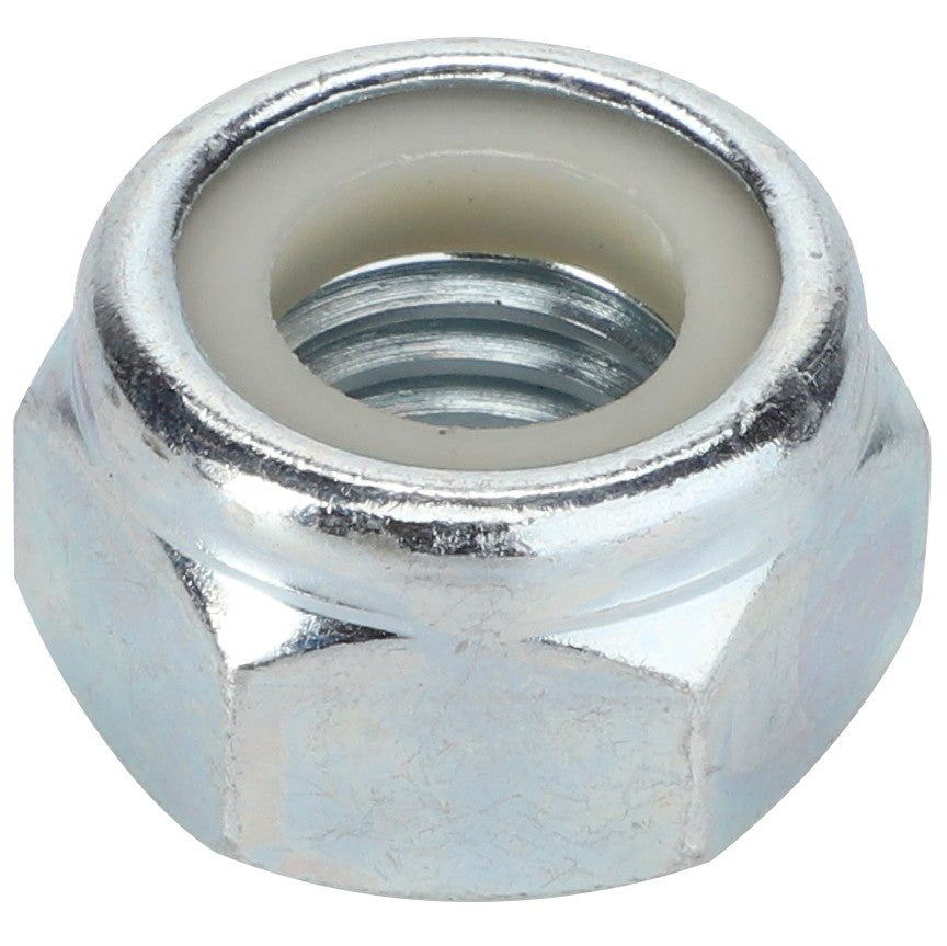 Close-up of the AGCO | Nut - 9-1030-0015-6, a hexagonal metal nut with internal threading, featuring a white nylon insert at the top to prevent loosening—ideal for securing parts in Massey Ferguson machinery.