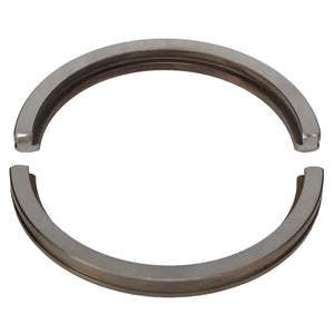 The AGCO SNAPRING - AG725281, consisting of two semi-circular metal retaining rings, is designed to be placed open-ended to form a circular shape for securely fastening components in machinery.