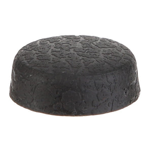 The AGCO | CAP - D45745105 by AGCO is a black, textured rubber bumper with a flat top and slightly rounded edges, making it perfect for protective cushioning or as an effective stopper.