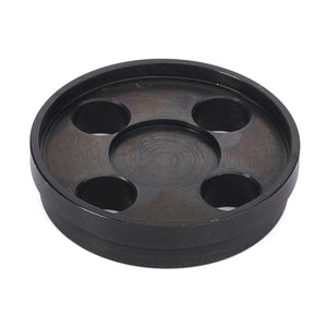 Introducing the AGCO | Spacer - Acw2193260, a black round plastic coaster from AGCO. It features four circular indents designed to hold your drinks securely and stylishly.