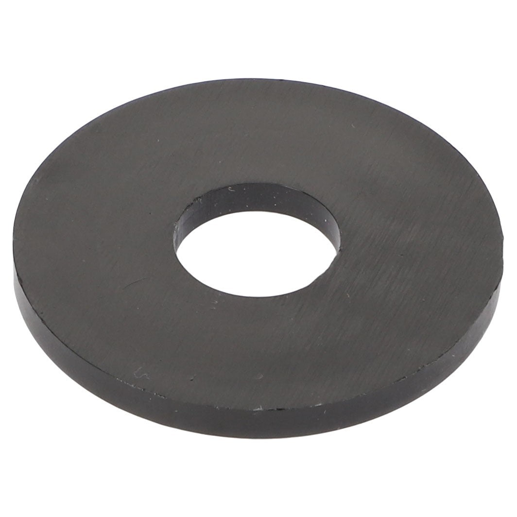 The AGCO NYLON WASHER - AG721909 is a flat, circular black washer with a central hole, designed for distributing the load and enhancing the stability of a threaded fastener.