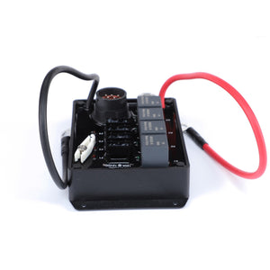 The AGCO | Fuse Panel, 30 A - AG124452 is a black electronic relay board with three relays, multiple connectors, and red and black wires attached. Isolated on a white background, this product exemplifies OE quality and is engineered for performance and durability.