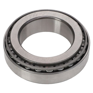 The AGCO Bearing Set - Acp0287130 is a metallic cylindrical tapered roller bearing featuring an open center and visible small cylindrical rollers, designed for mechanical applications to minimize friction and support both radial and axial loads. This product currently does not have an available description.