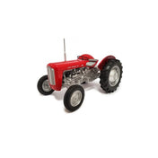 A red Massey Ferguson 35 toy tractor with detailed components is shown against a white background. This scale model, the Massey Ferguson 35 1:16 Scale - UH6655 by Universal Hobbies, represents the 1957 Massey Ferguson 35 Tractor, capturing every intricate detail with precision.