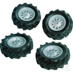 Four black and silver Pneumatic wheel set, silver - R40918 tires with rugged treads from Rolly Toys, perfect for a 4 wheels set, are placed on a white background.