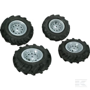 Four pneumatic wheels with silver rims from the Rolly Toys Pneumatic Wheel Set for X-Trac (Product ID: R40924) are arranged on a white background.