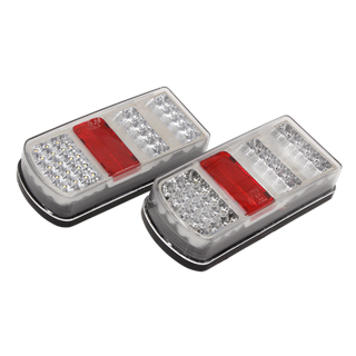 Two Rear Rectangle Lamp Clusters (Pair) SMD LED 12V - TB19LED by Sealey, featuring clear and red sections with multiple SMD LED bulbs, form an E-Mark approved 6-function set designed for optimal visibility.