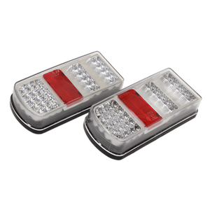 Two Rear Rectangle Lamp Clusters (Pair) SMD LED 12V - TB19LED by Sealey, featuring clear and red sections with multiple SMD LED bulbs, form an E-Mark approved 6-function set designed for optimal visibility.