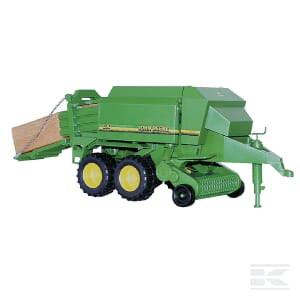 The Bruder John Deere baler - U02017, featuring multiple wheels, is expertly designed for compacting and bundling crops such as hay or straw.