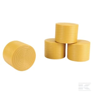 Four stacks of Bruder's Unwrapped round bales (4x) - U02344, resembling a plastic toy for age 3+, are shown. Three stacks form a triangular arrangement, while one stack lies horizontally to the left.