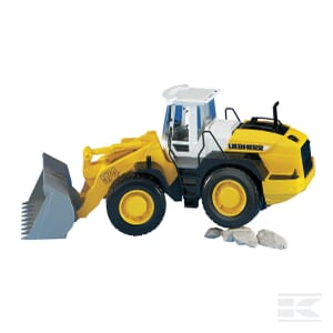 A Bruder Liebherr Wheeled Loader (U02430) in yellow and black plastic with a white cab, accompanied by three rocks in front of it.