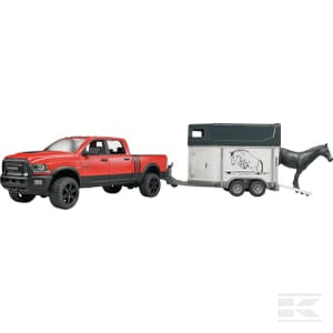 A Bruder RAM Power truck+horse trailer (U02501) in red is towing a gray horse trailer with a black horse standing next to it.