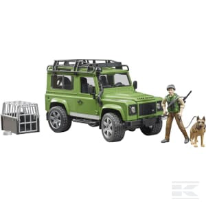 Land Rover Defender station wagon with forester and dog - U02587