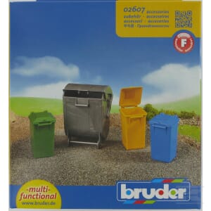 Four miniature waste bins in different colors (green, silver, yellow, and blue) are displayed on a gravel surface. These plastic toy bins are branded "Bruder" and labeled "multi-functional." They are designed as 1:16 scale models for realistic play and are sold under the product name "Refuse bin for U02660 (4 pcs) - U02607.