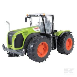 A green and black Bruder Claas Xerion 5000 - U03015 tractor with large orange wheels, ideal for young enthusiasts of agriculture.