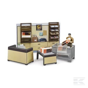 The Bruder UPS Store - U62250 diorama showcases a meticulously detailed scene of a UPS store. It features shelves filled with parcels, a counter, a man holding a package, a metal cart brimming with packages, and chairs for customers. The included accessories enhance the realism and charm of the set.