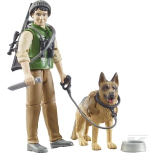 The Bruder Forester with Dog and Equipment - U62660 features a plastic toy figure equipped with a knife, holding a leash attached to a German Shepherd figure, and standing next to a small silver dish. The Forester doll is dressed in a green vest over a white shirt, brown pants, and a grey beanie.