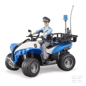 A toy figure of a policeman sits on a blue and white quad bike equipped with an emergency services siren and an antenna attached to the back, from the brand Bruder, product name Police Quad with Policeman - U63010.