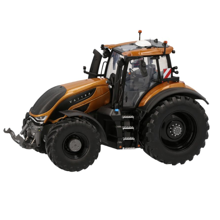 A brown Valtra - S416 Amber (V42803550) tractor from AGCO, featuring large black tires and modern technology, is seen in a side view. This 1:32 scaled model showcases intricate details and precision engineering.