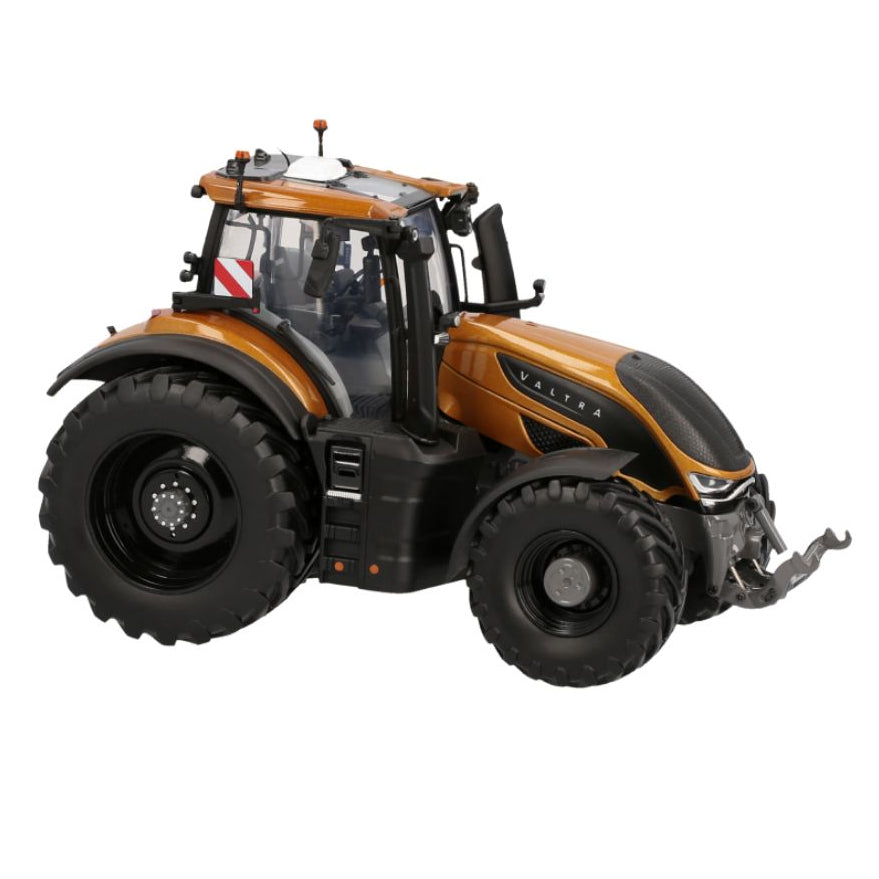 An AGCO Valtra - S416 Amber (V42803550) tractor, featuring large black tires and various attachments, is displayed from the side on a white background.