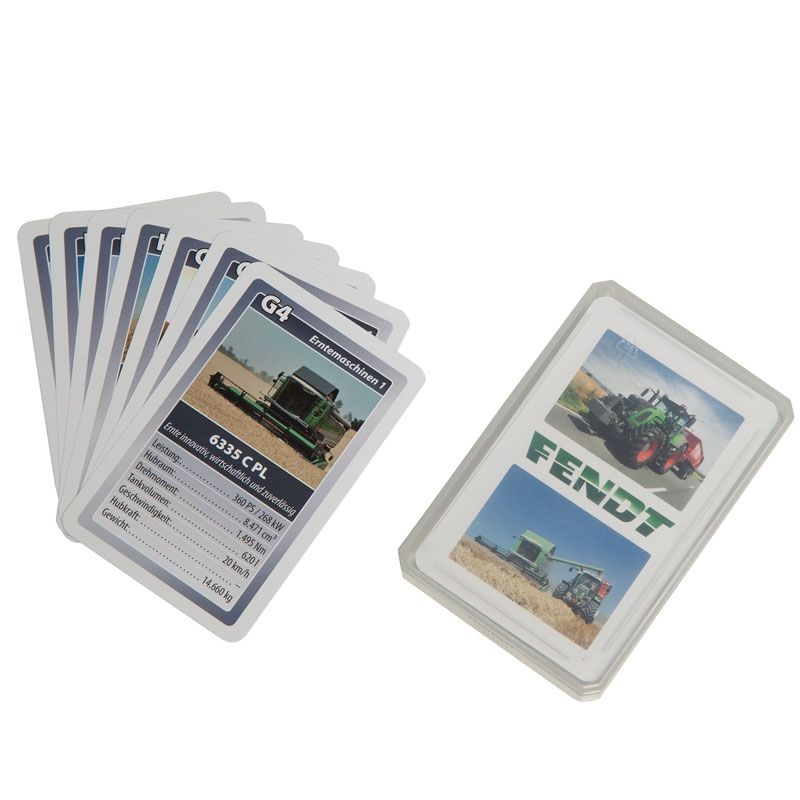 A partially spread-out deck of Fendt - Happy families - X991005036000 playing cards, featuring images of agricultural machinery, alongside an open plastic case displaying the Fendt logo and a tractor image, offers a delightful experience for fans of Fendt tractors and AGCO enthusiasts.